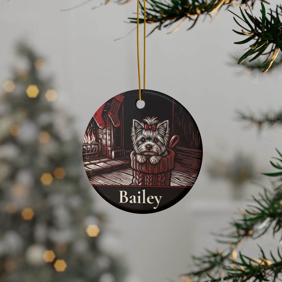 Personalized Yorkshire Terrier Christmas ornament hanging on a Christmas tree, shown with the sample name Bailey