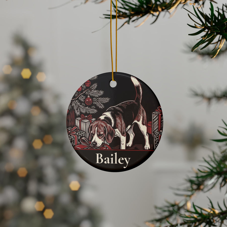 Personalized Beagle Christmas ornament hanging on a Christmas tree, shown with the sample name Bailey