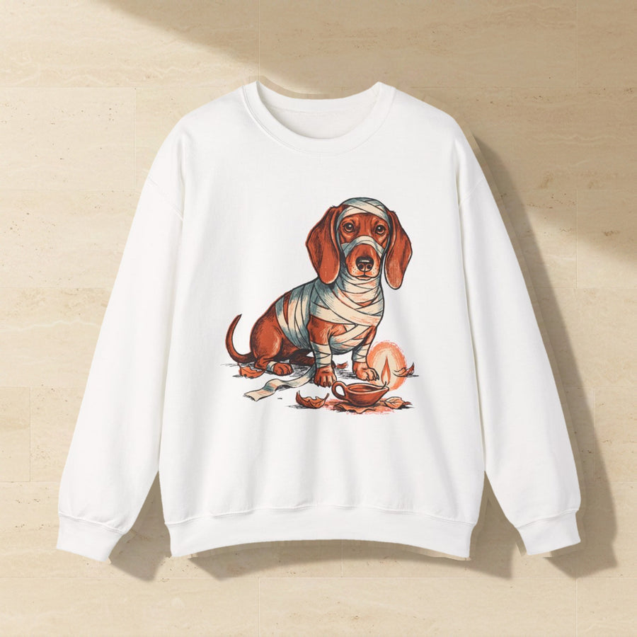 Dachshund Halloween Crewneck laid flat on a warm limestone surface, shot from overhead