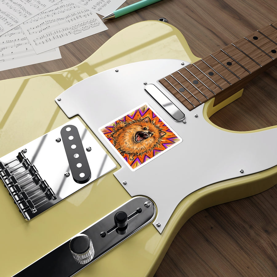 Pomeranian Comic Pop Art vinyl sticker by Tritan, on a guitar