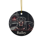 Front of the personalized Rottweiler Christmas ornament, ceramic, 2.9 inches, with the sample name Bailey