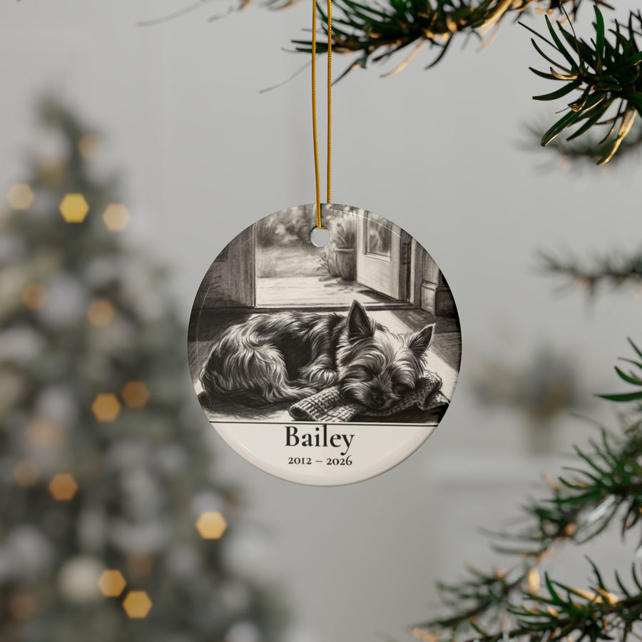Personalized Yorkshire Terrier memorial ornament hanging on a Christmas tree, shown with the sample name Bailey