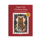 Paper-Cut Christmas Dogs coloring book, front cover: a Shiba Inu with a Christmas bauble in a folk frame