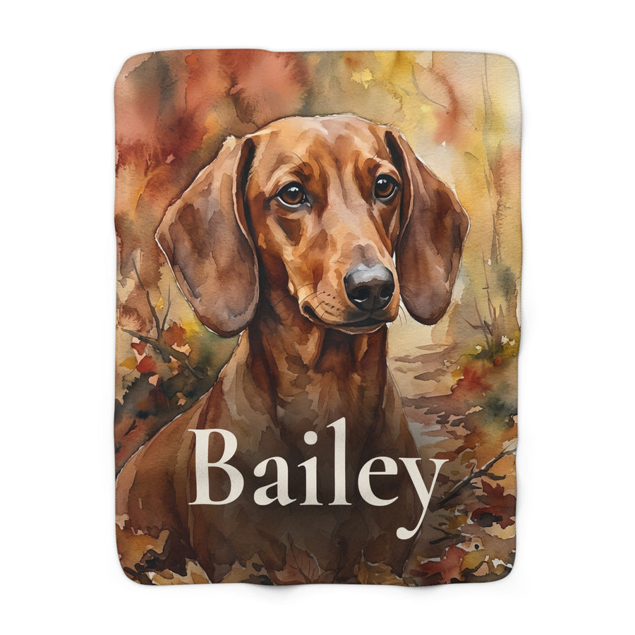 Personalized Dachshund sherpa fleece blanket, watercolor-style portrait with the dog's name across the lower part