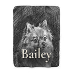 Personalized Pomeranian sherpa fleece blanket, charcoal-style portrait with the dog's name across the lower part