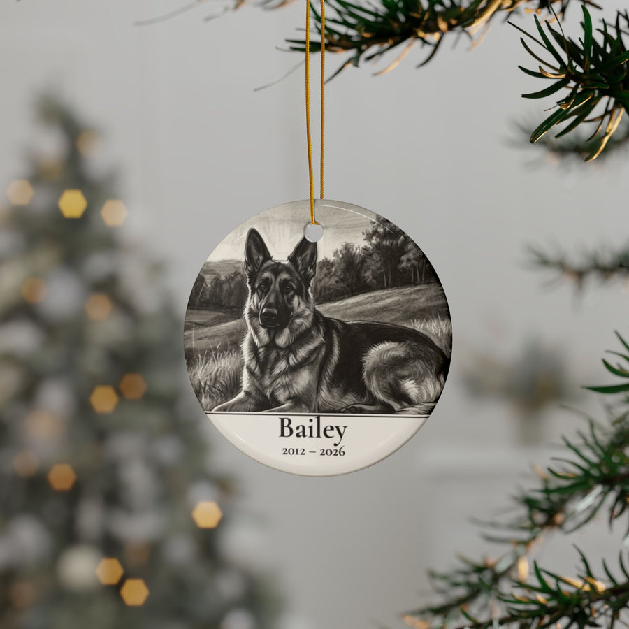 Personalized German Shepherd memorial ornament hanging on a Christmas tree, shown with the sample name Bailey