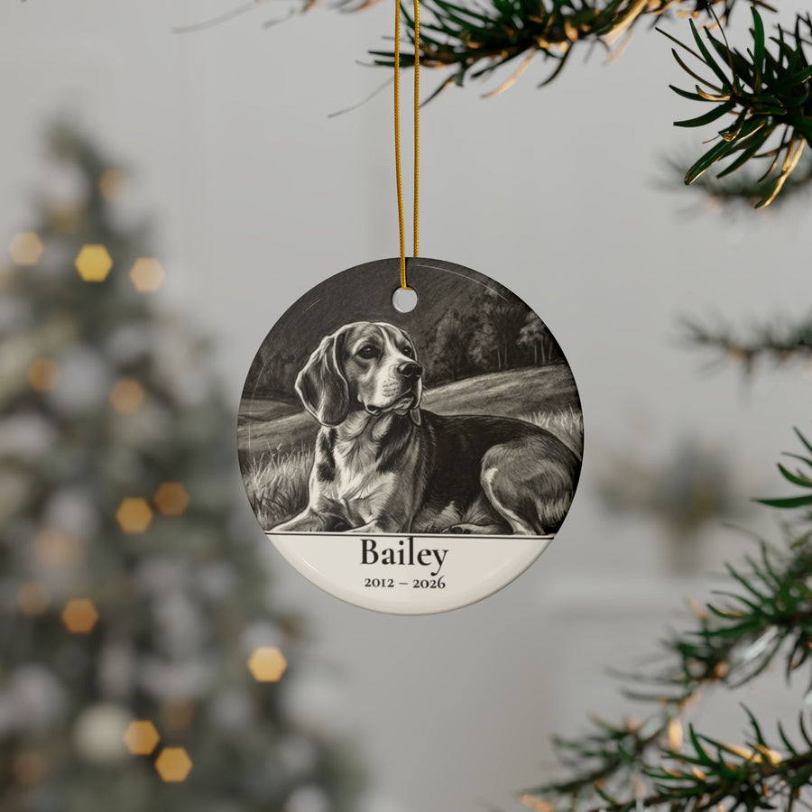 Personalized Beagle memorial ornament hanging on a Christmas tree, shown with the sample name Bailey