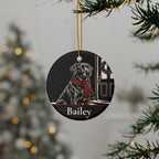 Personalized Labrador Retriever Christmas ornament hanging on a Christmas tree, shown with the sample name Bailey