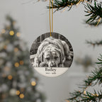 Personalized Labrador Retriever memorial ornament hanging on a Christmas tree, shown with the sample name Bailey