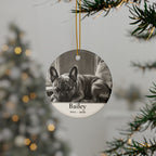 Personalized French Bulldog memorial ornament hanging on a Christmas tree, shown with the sample name Bailey