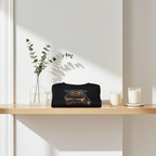 Rottweiler painterly crewneck folded on a wooden shelf with eucalyptus and a candle in soft light
