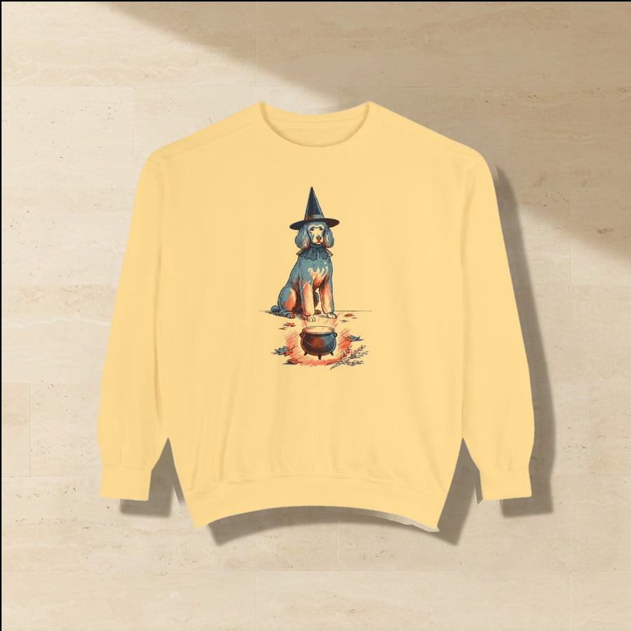 Poodle Halloween Sweatshirt laid flat on a warm limestone surface, shot from overhead