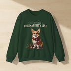 Corgi Too Cute for the Naughty List Crewneck Sweatshirt, Palette Knife Style Holiday Dog Art, Corgi Lover Gift laid flat on a warm limestone surface, shot from overhead