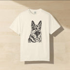 German Shepherd Woodcut Art Shirt laid flat on a warm limestone surface, shot from overhead