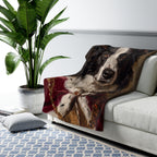 Border Collie Kings & Queens sherpa blanket by Tritan, on sofa