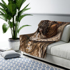 Boxer Renaissance Royal sherpa blanket by Tritan, on sofa