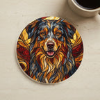 Australian Shepherd Stained Glass Warm Jewel Cork Back Coaster cork coaster shown on a warm limestone surface beside a mug