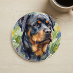 Rottweiler Watercolor Garden Peek Cork Back Coaster cork coaster shown on a warm limestone surface beside a mug