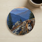 Acrylic Painting Boxer - Mountain Overlook cork coaster shown on a warm limestone surface beside a mug