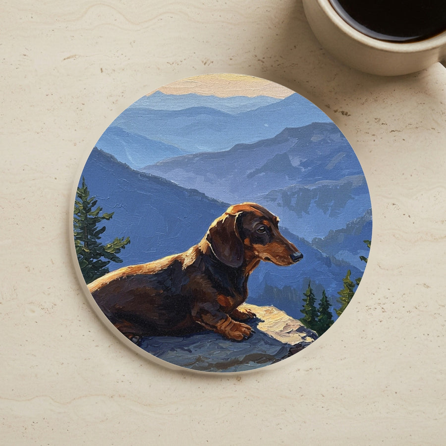 Acrylic Painting Dachshund - Mountain Overlook cork coaster shown on a warm limestone surface beside a mug