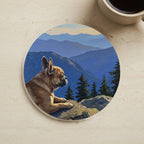 Acrylic Painting French Bulldog - Mountain Overlook cork coaster shown on a warm limestone surface beside a mug
