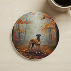 Acrylic Painting Great Dane - Autumn Woods cork coaster shown on a warm limestone surface beside a mug