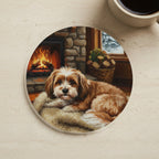 Acrylic Painting Havanese - Winter Hearth cork coaster shown on a warm limestone surface beside a mug