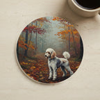 Acrylic Painting Poodle - Autumn Woods cork coaster shown on a warm limestone surface beside a mug
