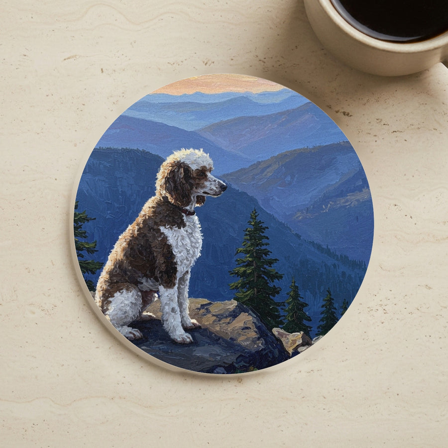 Acrylic Painting Poodle - Mountain Overlook cork coaster shown on a warm limestone surface beside a mug