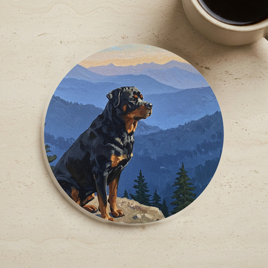 Acrylic Painting Rottweiler - Mountain Overlook cork coaster shown on a warm limestone surface beside a mug