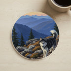 Acrylic Painting Siberian Husky - Mountain Overlook cork coaster shown on a warm limestone surface beside a mug