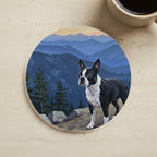 Acrylic Painting Boston Terrier - Mountain Overlook cork coaster shown on a warm limestone surface beside a mug
