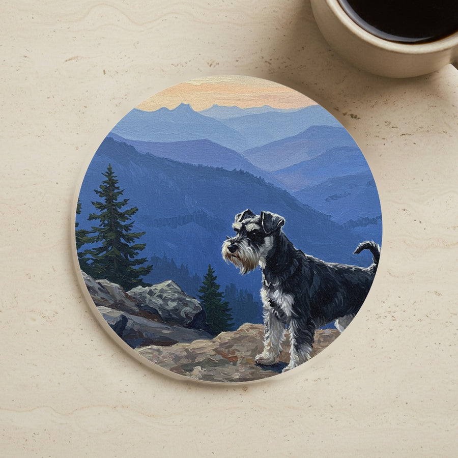 Acrylic Painting Miniature Schnauzer - Mountain Overlook cork coaster shown on a warm limestone surface beside a mug