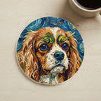 Cavalier King Charles Spaniel Oil Painting Soccer Coaster cork coaster shown on a warm limestone surface beside a mug