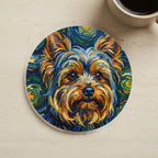 Yorkshire Terrier Oil Painting Soccer Coaster cork coaster shown on a warm limestone surface beside a mug