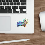 Corgi Cosmic vinyl sticker by Tritan, on a skateboard