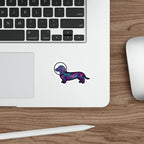 Dachshund Cosmic vinyl sticker by Tritan, on a laptop