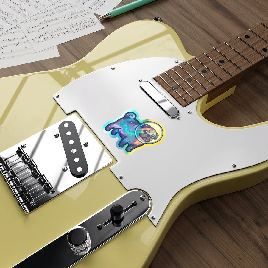 Pug Cosmic vinyl sticker by Tritan, on a guitar