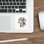 Dachshund Graphite vinyl sticker by Tritan, on a laptop