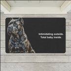 Cane Corso Doormat shown flat on a pale painted porch outside a white front door