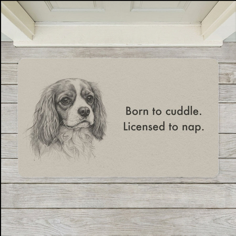 Cavalier King Charles Spaniel Doormat shown flat on a pale painted porch outside a white front door