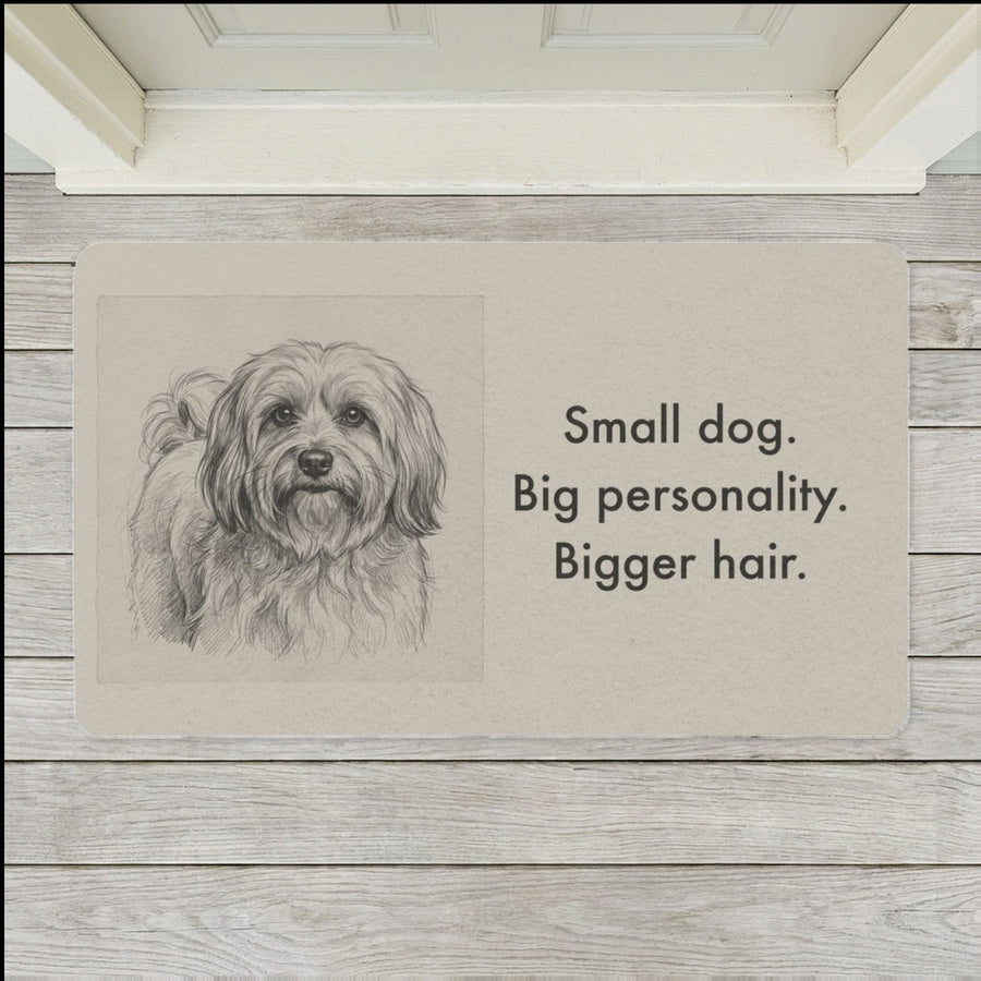 Havanese Doormat shown flat on a pale painted porch outside a white front door