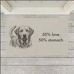 Labrador Retriever Doormat shown flat on a pale painted porch outside a white front door