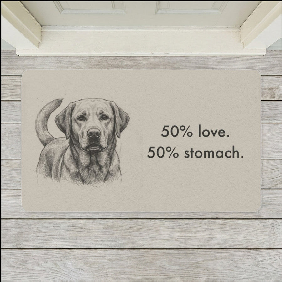 Labrador Retriever Doormat shown flat on a pale painted porch outside a white front door