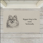 Pomeranian Doormat shown flat on a pale painted porch outside a white front door