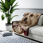 Havanese Kings & Queens sherpa blanket by Tritan, on sofa