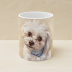 Maltese — Painted Portrait Mug (Style A, Front + Back) shown on a warm limestone shelf, front view