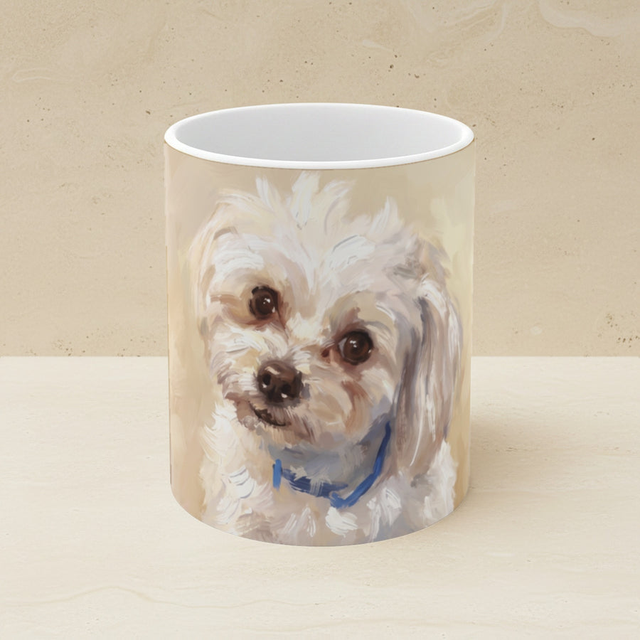 Maltese — Painted Portrait Mug (Style A, Front + Back) shown on a warm limestone shelf, front view