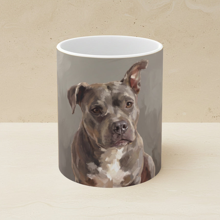Blue Staffy — Painted Portrait Mug (Front + Back) shown on a warm limestone shelf, front view