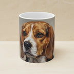 Beagle Oil Portrait Ceramic Mug 11oz shown on a warm limestone shelf, front view